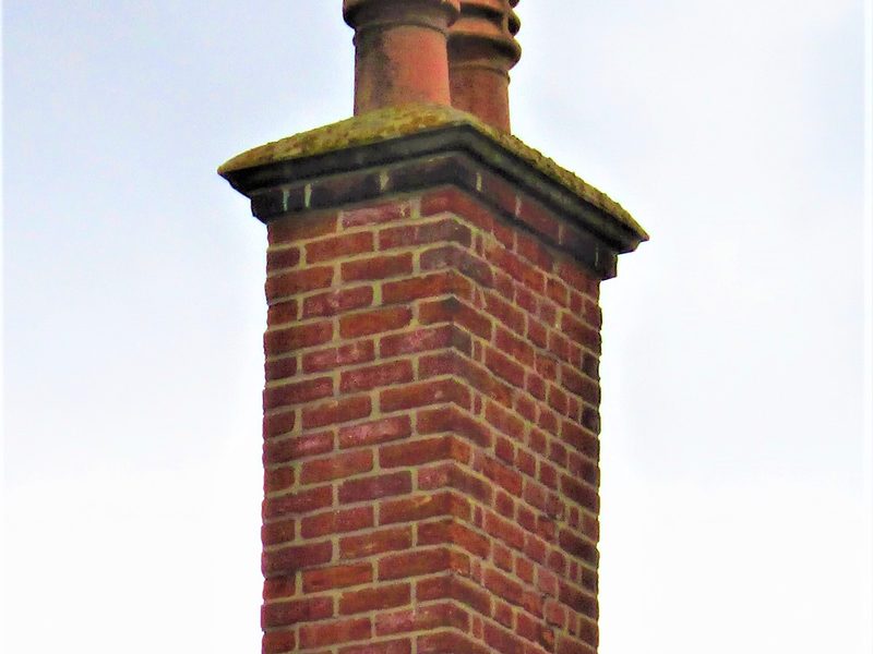 New lead flashing on a brick chimney stack